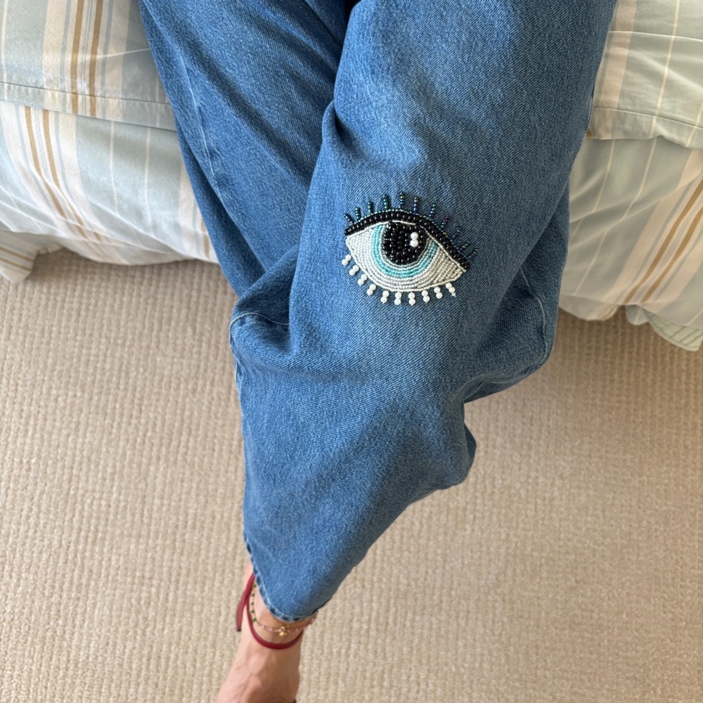 Frame low slung barrel hand embroidered Evil Eye Detail Jeans